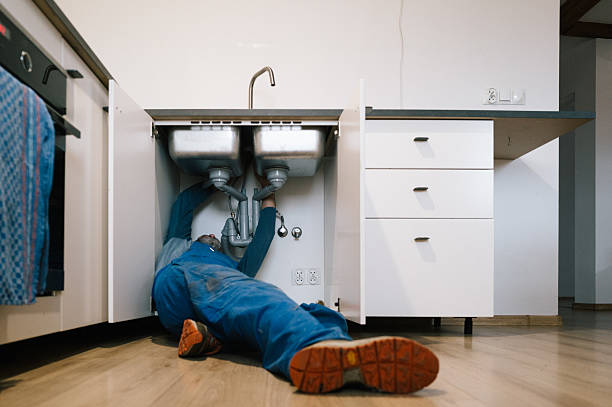 Professional Plumbing technician working in Booneville, IA